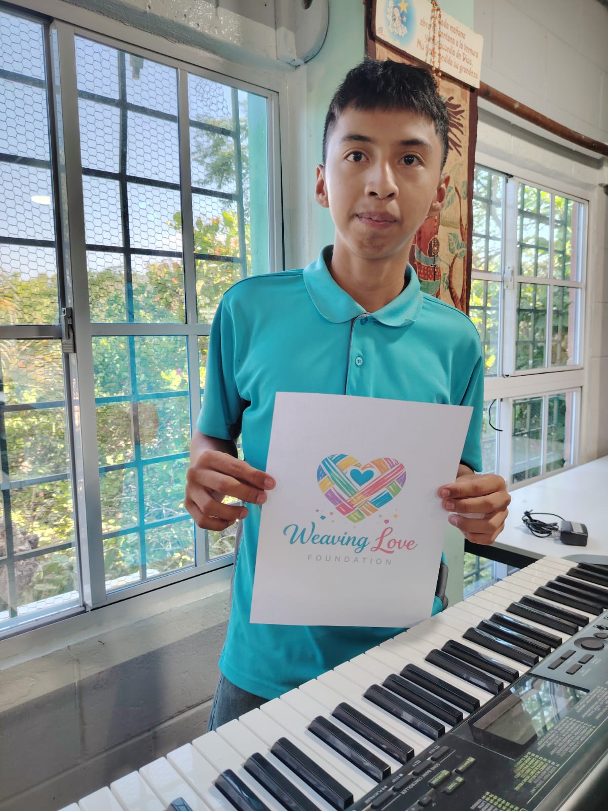 Participant holding a foundation page indoors